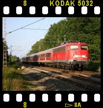 1042.561-9 am 08.04.1987 mit R 3632 auf der Innbr&uuml;cke bei Passau.
